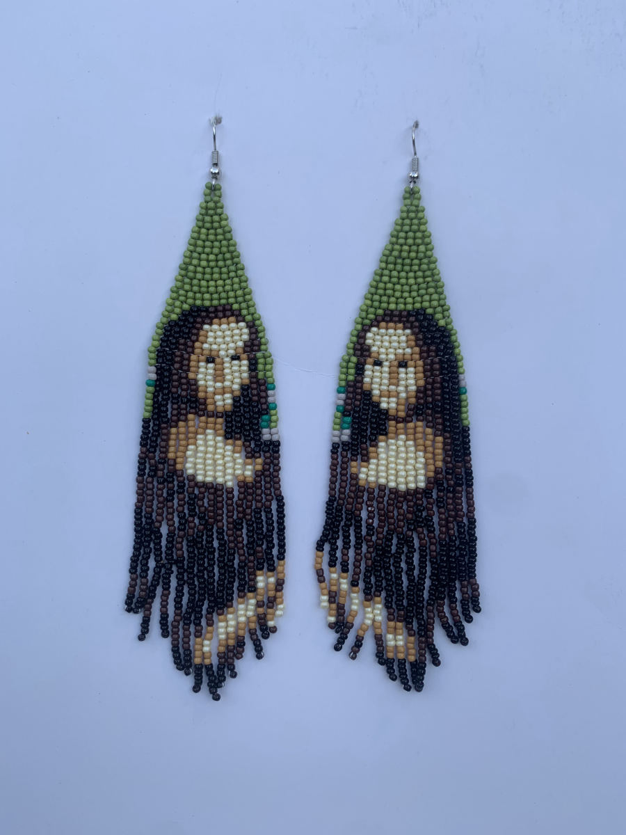 Long fringe earrings with a beaded Mona Lisa figure in the upper panel — serene face and dark hair in cream, tan and brown beads, with long seed bead fringe below in brown and black.