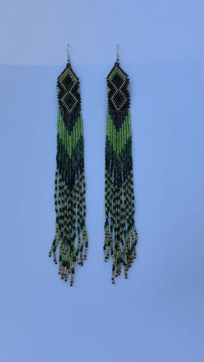Pair of long green beaded fringe drop earrings with diamond tops.