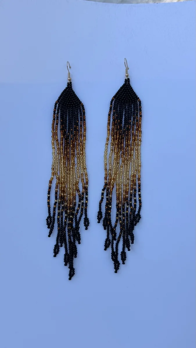 Pair of long black-to-bronze ombre beaded drop earrings with gold hooks.