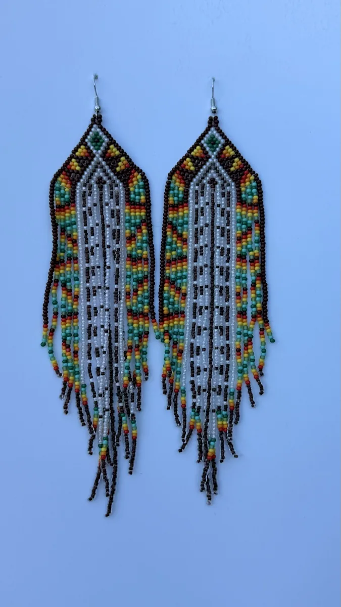 Pair of long beaded earrings with gray-green triangular tops and colorful fringe strands.