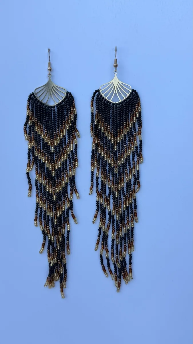 Pair of black and bronze beaded fringe earrings with gold fan tops.