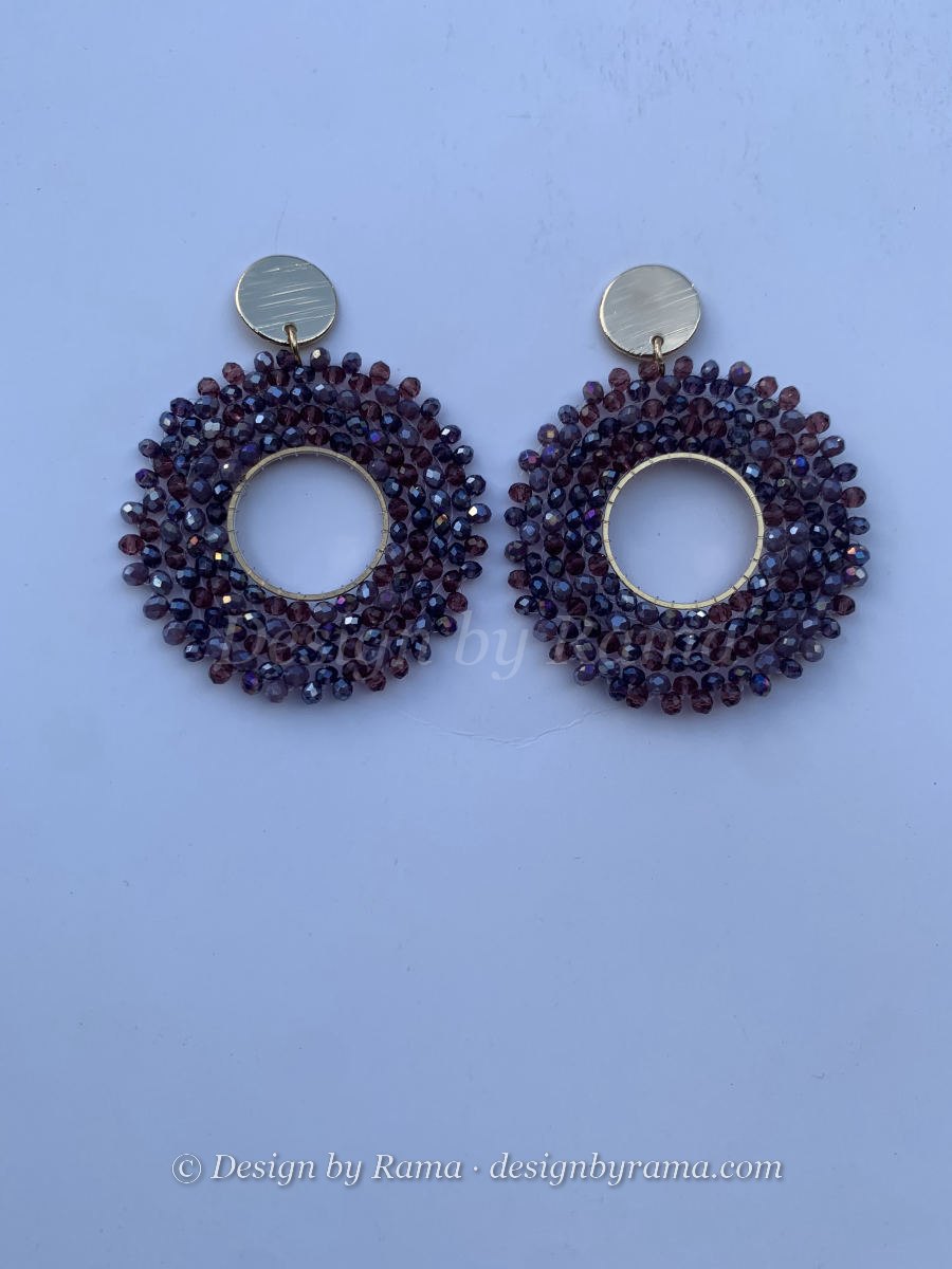 Large open circle hoop earrings in mixed plum and mauve faceted crystals with flat gold disc stud top.