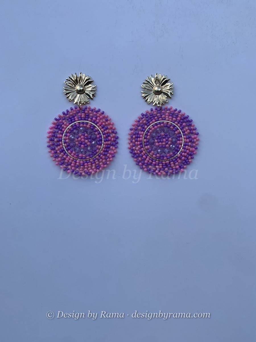 Large round disc earrings with concentric rings of purple and pink seed beads and silver daisy flower stud top.