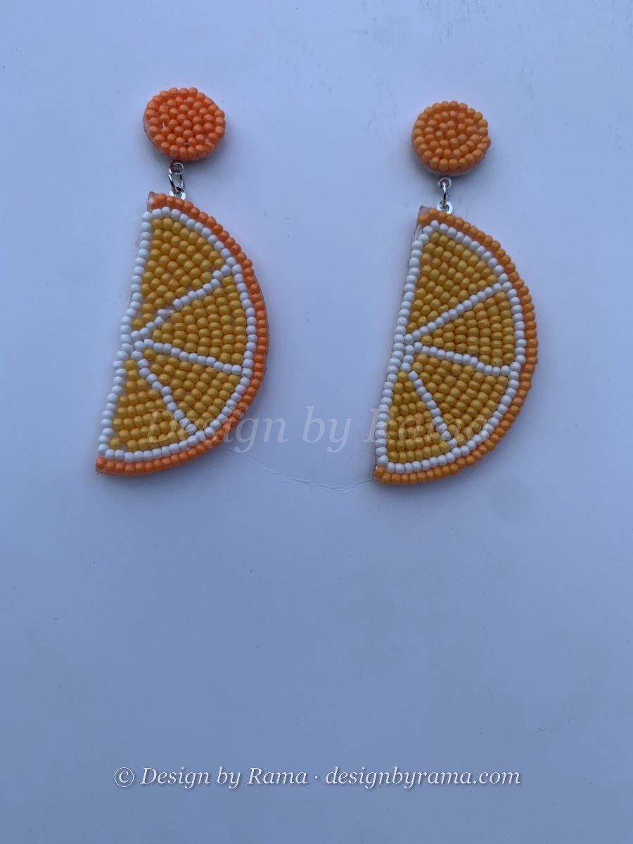 Beaded orange citrus slice earrings in warm orange and yellow tones with orange round stud top.