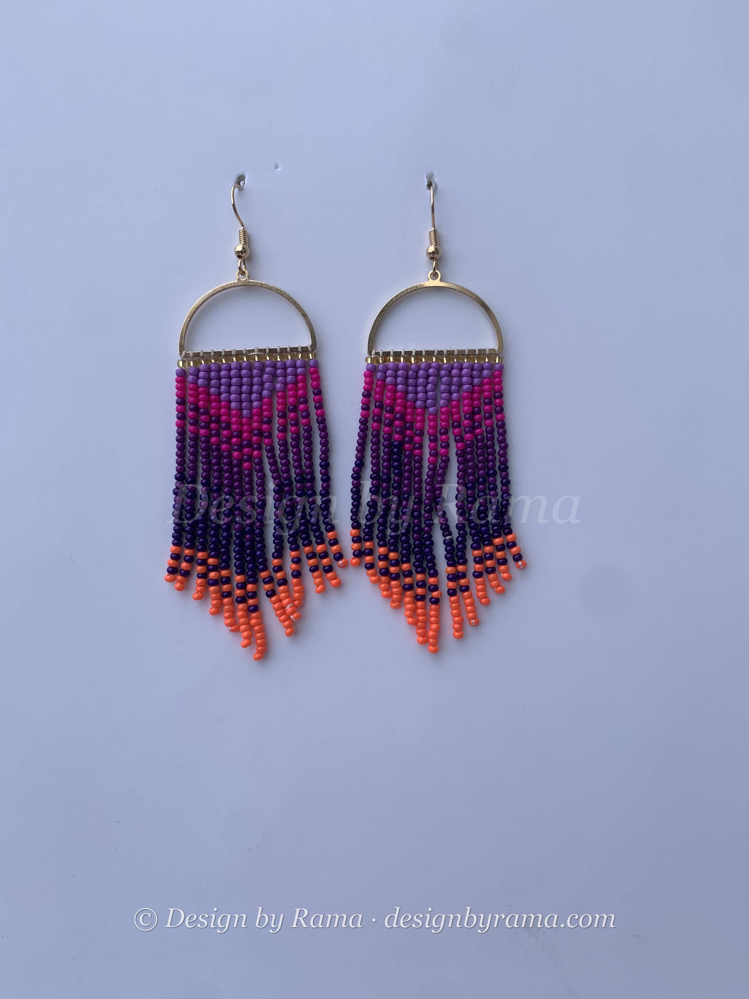 Ajumako Sunset Arc — handmade purple, orange, pink beaded fringe earrings by Rama, Ghana, Duncan BC