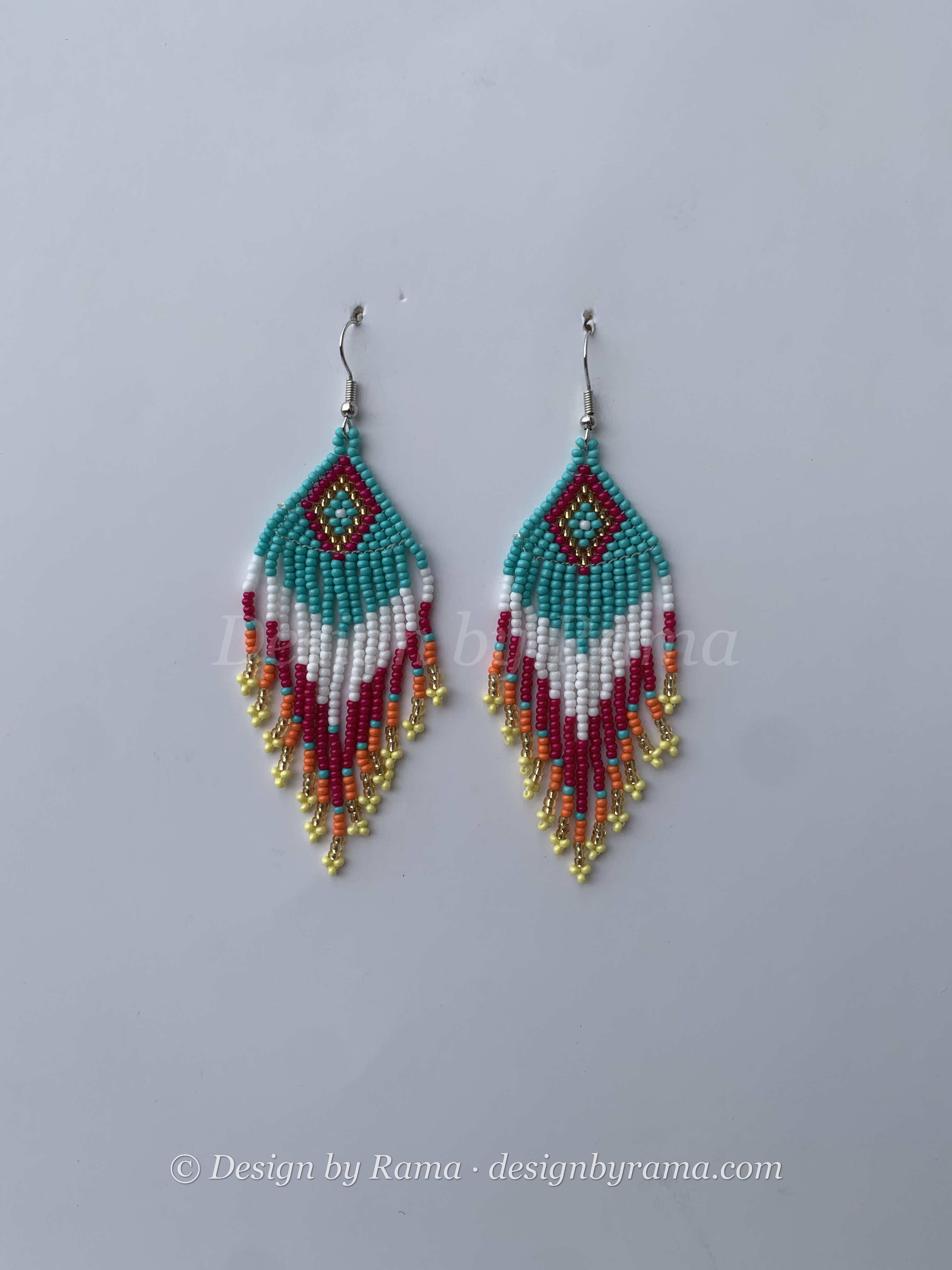 Dadieso Lagoon Feather — handmade teal, red, gold beaded fringe earrings by Rama, Ghana, Duncan BC