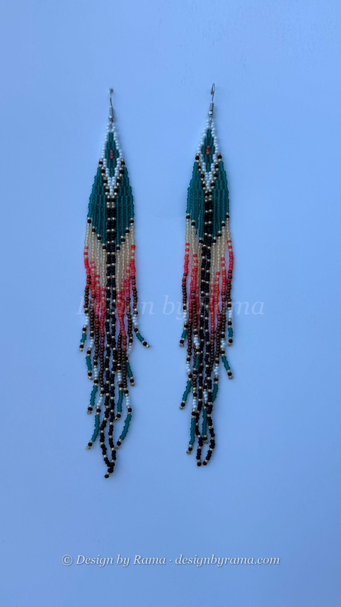 Pair of teal beaded fringe earrings with chevron tops and multicolored strands.