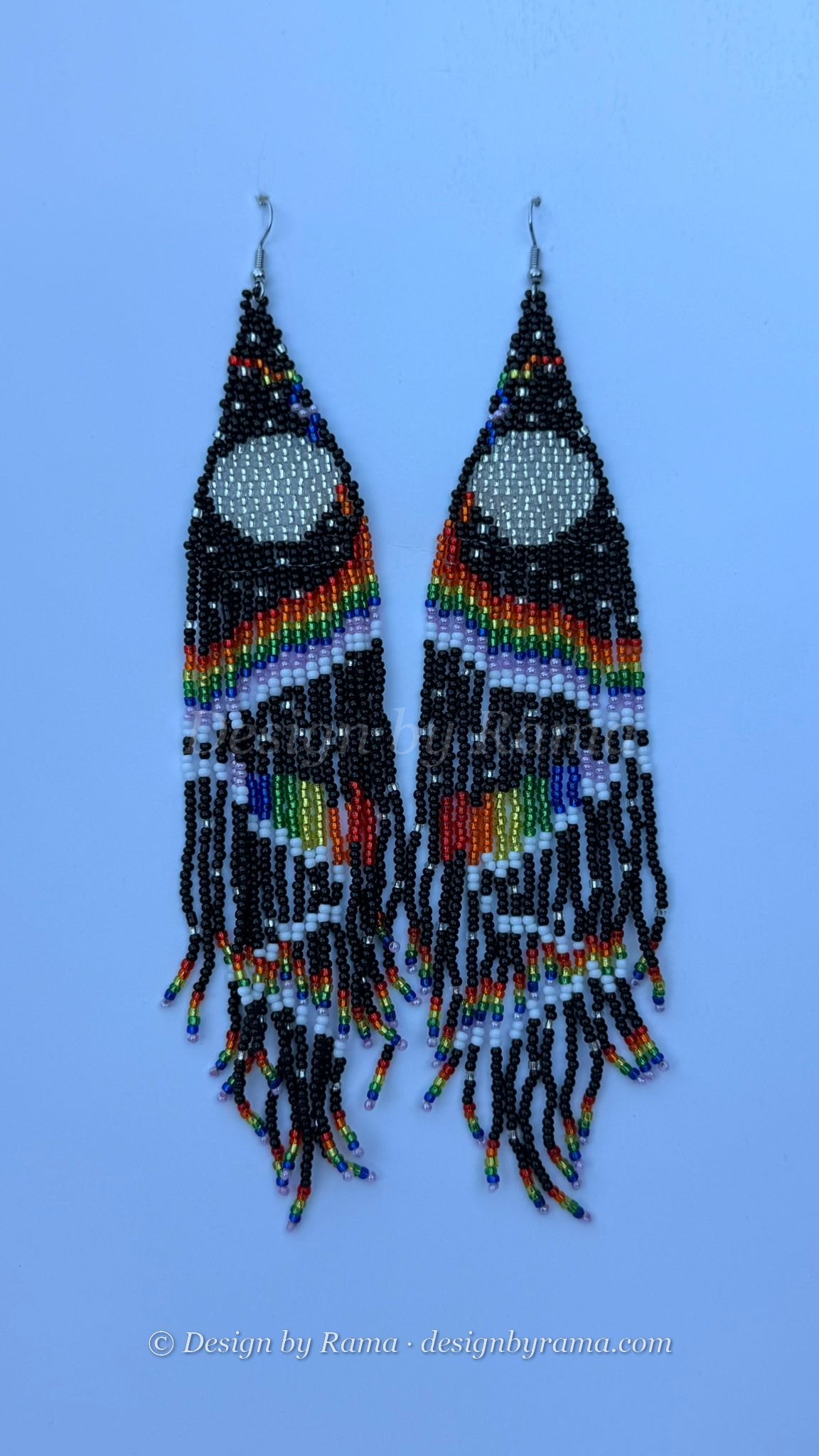Pair of beaded drop earrings with crescent moon design in blue and multicolored gradient fringes