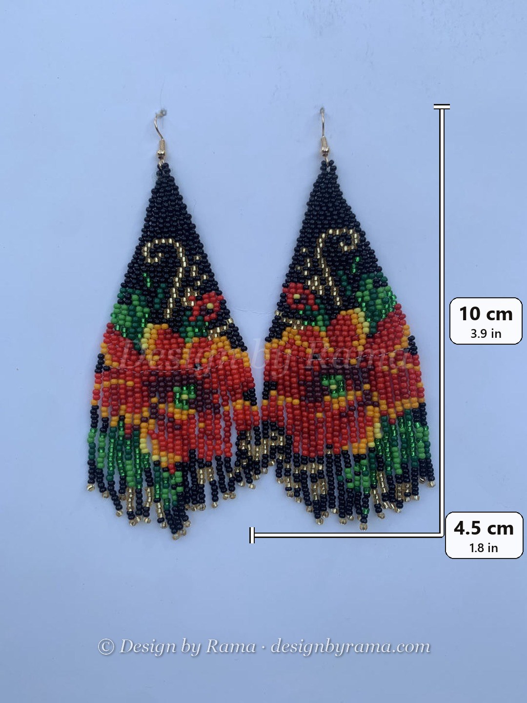 Long fringe earrings with red roses on vine botanical motif on black bead ground, red and green accents, wire hook.