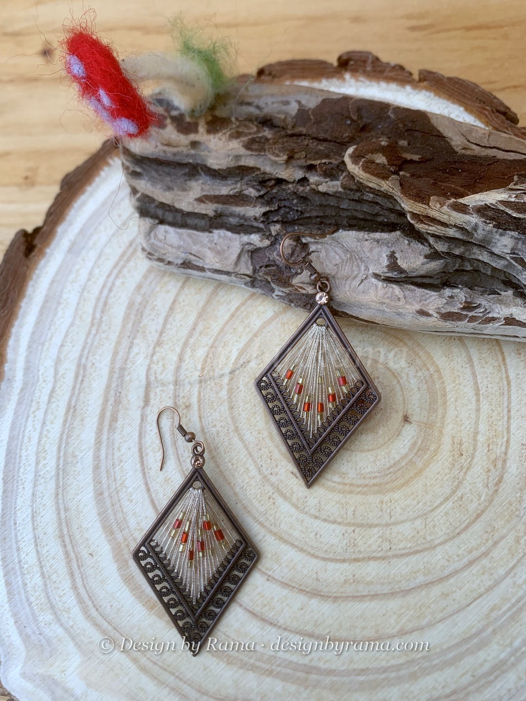 Larabanga Ember Diamond — dark copper, cream, red, orange thread earrings, Design by Rama, Duncan BC